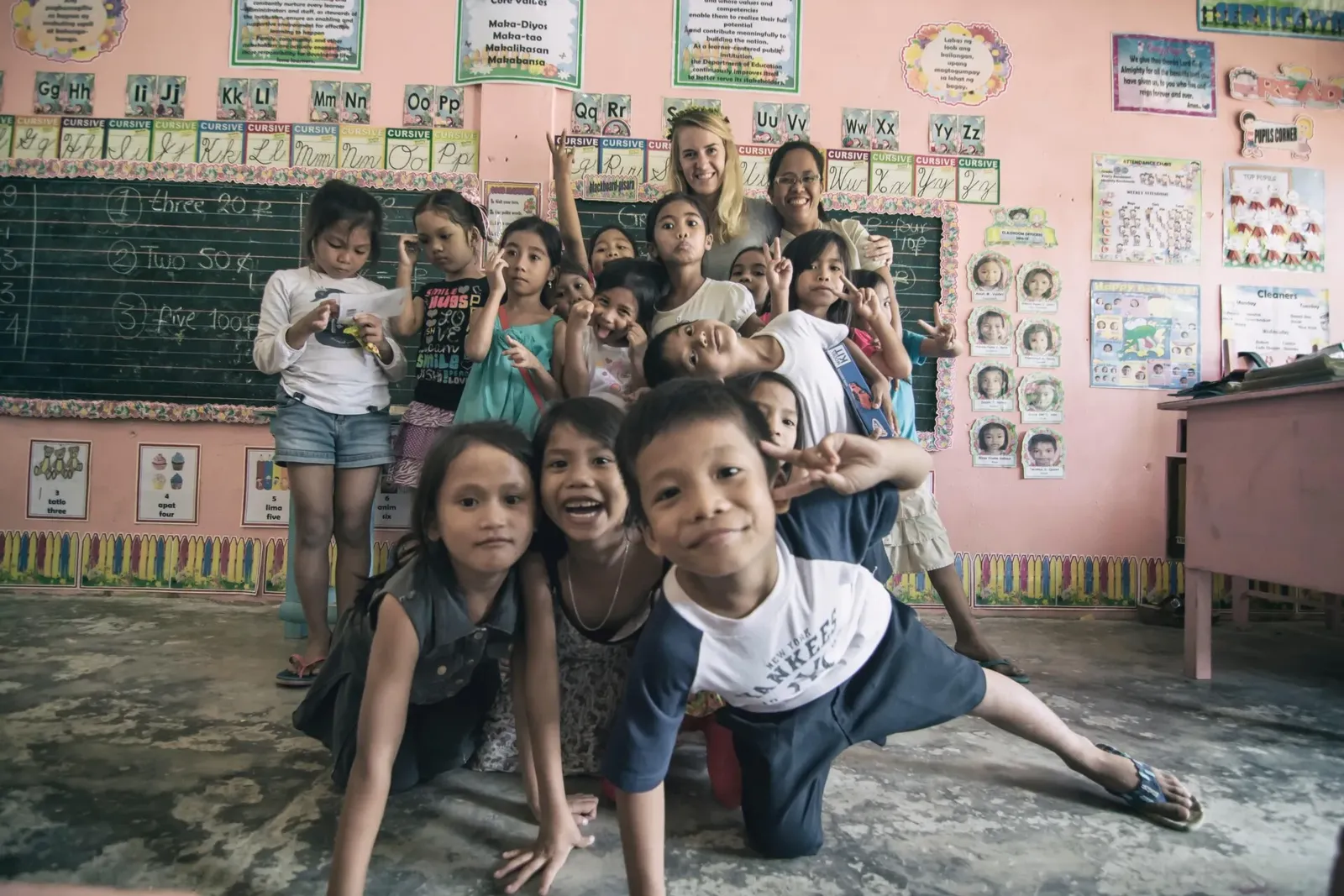 Group photo with the students, education project in Palawan schools, Philippines