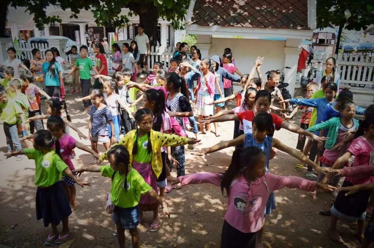 Fr LAO01 Library Kids Class Enjoys Some More Streches . .